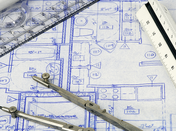 製図用具が置かれた建築図面